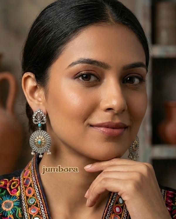 Dual Tone Silver Look Alike (SLA) Statement Oxidized German Silver Earrings with Turquoise Stones Worn by Model for sizing & Scaling