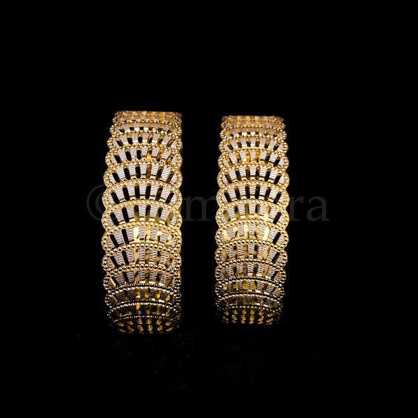 Shimmering Intricate Cutwork Two Tone Bangle with Rhodium polish