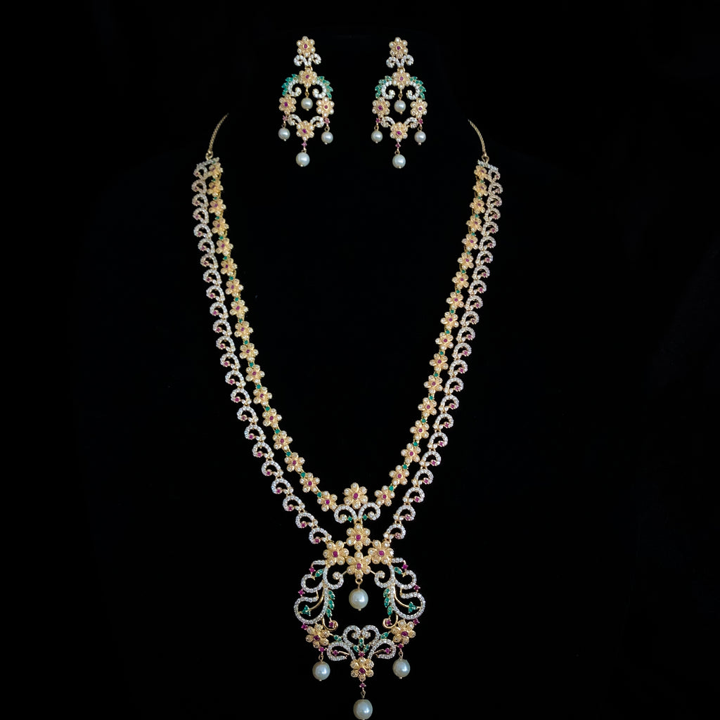 Exquisite Two-layer Long Zircon (CZ) Necklace set with white, red, and green stones.
