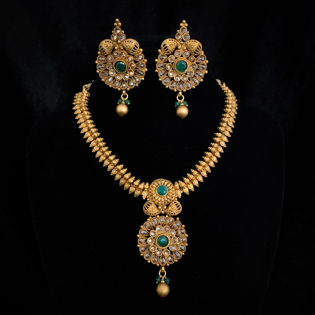 Captivating Matte Antique Gold Necklace Set with LCD stones