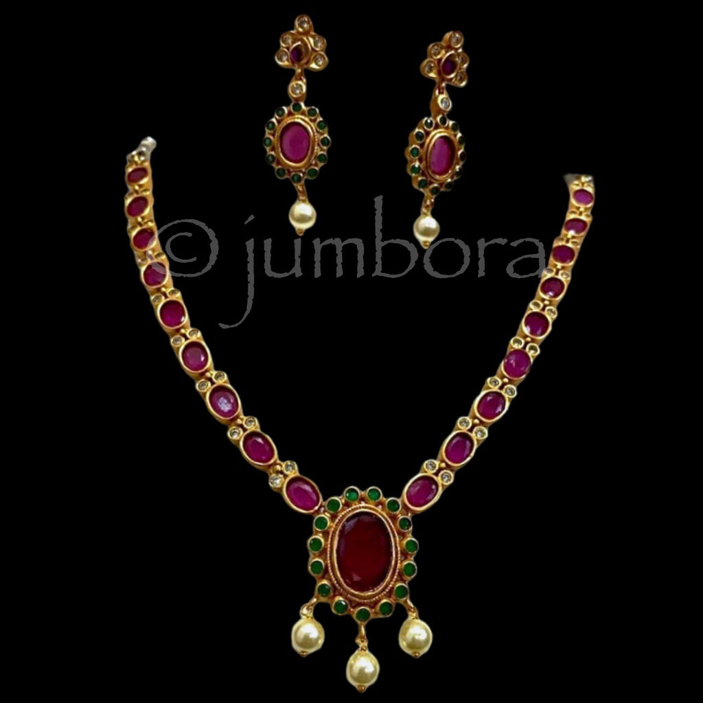 Matte Antique Necklace Set With AD Ruby red and Green Stones