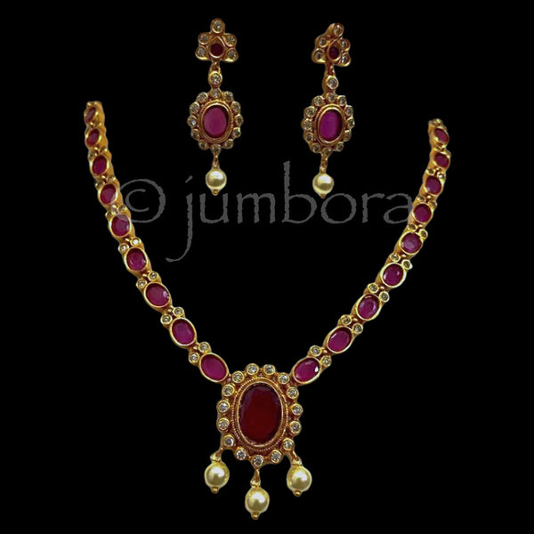 Matte Antique Necklace Set With AD Ruby red and Green Stones