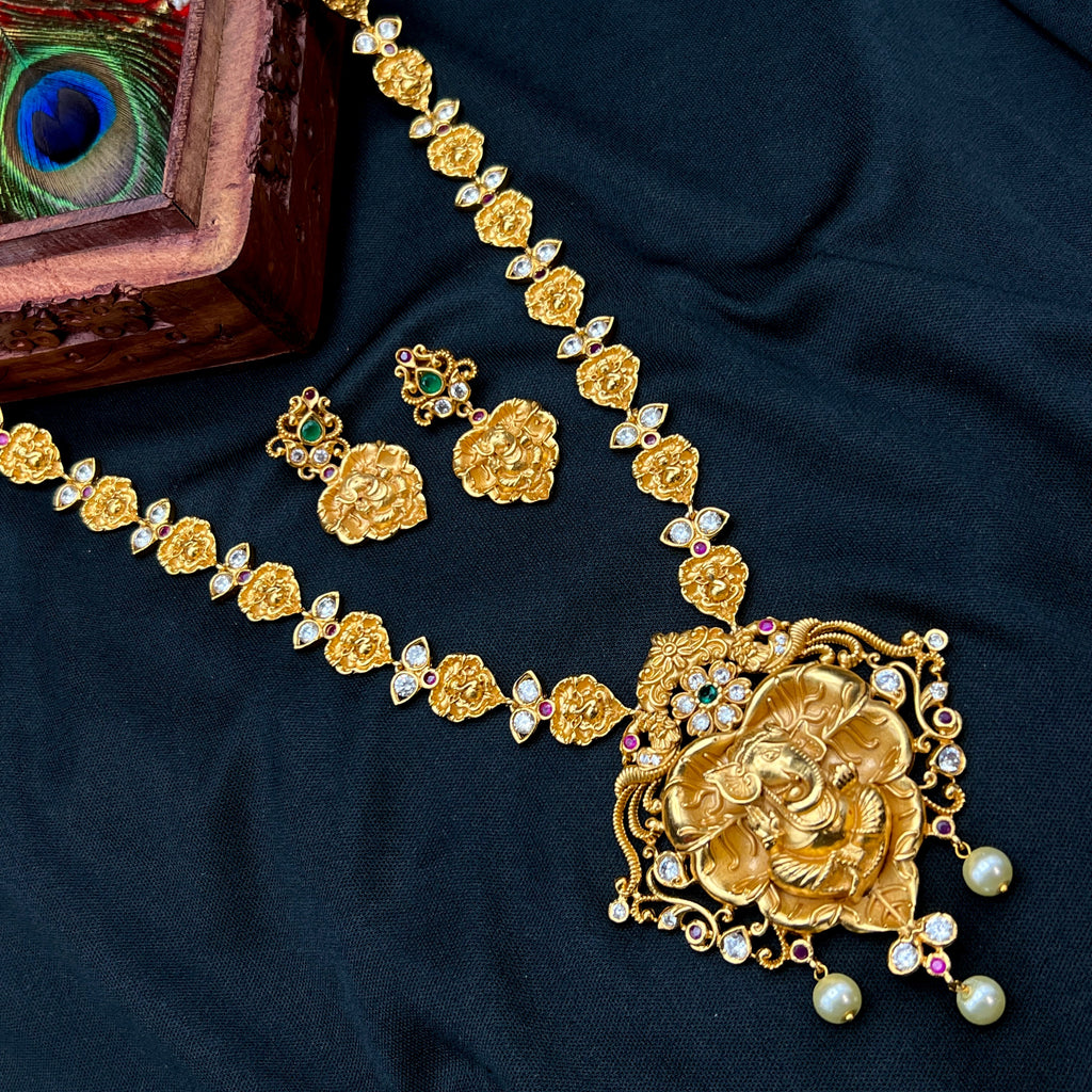 Gold Alike Ganesha In Leaf Necklace set